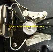 Cine-Kodak Model E No 82329 sprocket clamps opened ;10% Cine-Kodak Model E No 82329 sprocket clamps opened ;10%